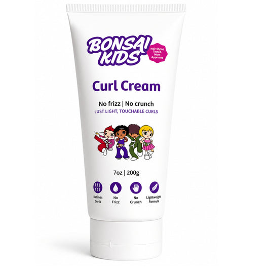 A white squeeze tube of Bonsai Kids Curl Cream with purple text and cartoon children on the label, shown on a clean white background.