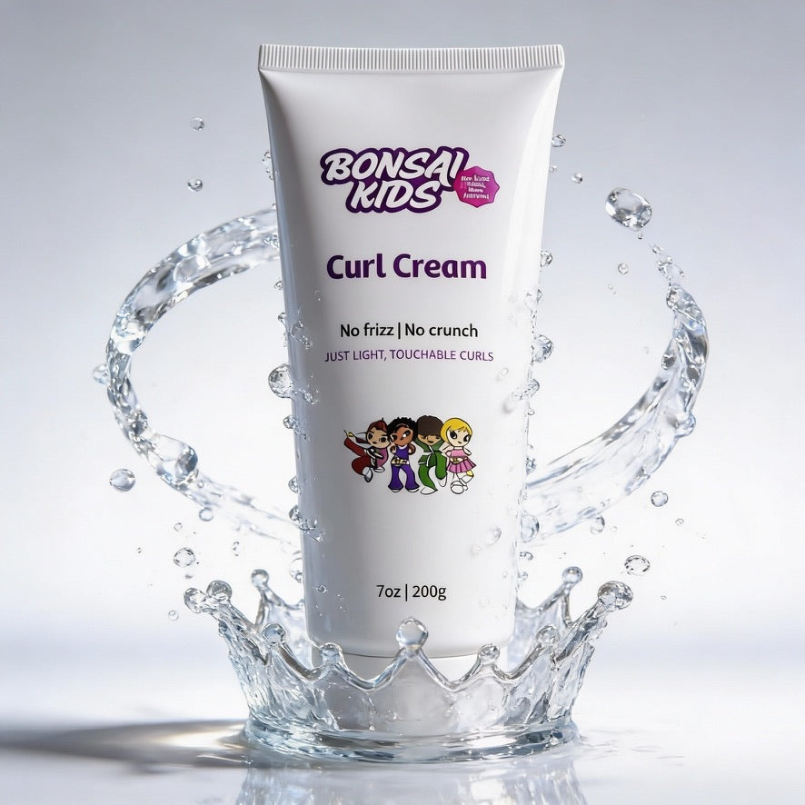 Bonsai Kids Curl Cream tube with water splash on a gray background